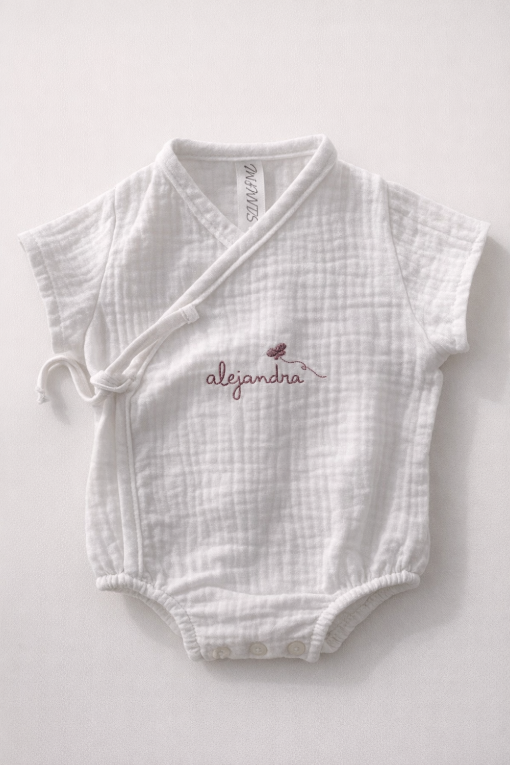PELELE CRUZADO MARIPOSA PERSONALIZADO