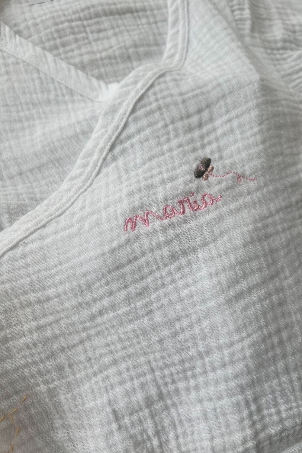 PELELE CRUZADO MARIPOSA PERSONALIZADO